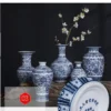 S10b414c7d3e746a3b6ee6149e8be2ae34.webp Porcelain Decorative Vase