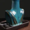 S5516a260550945fd901cbb1e58c4125f2.webp Ceramic Face Incense Burner