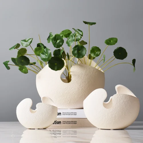 S84084ce884b04ca88145cdba9f3a742cu-1.webp Geometric Eggshell Ceramic Vase
