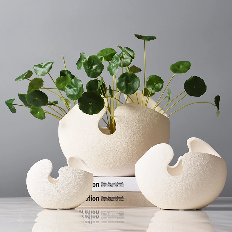 S84084ce884b04ca88145cdba9f3a742cu-1.webp Geometric Eggshell Ceramic Vase